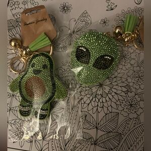 Rhinestone puffy bling keychains/charms. Green alien and green avocado.
